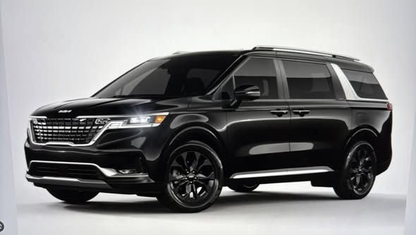 Black Kia Carnival minivan